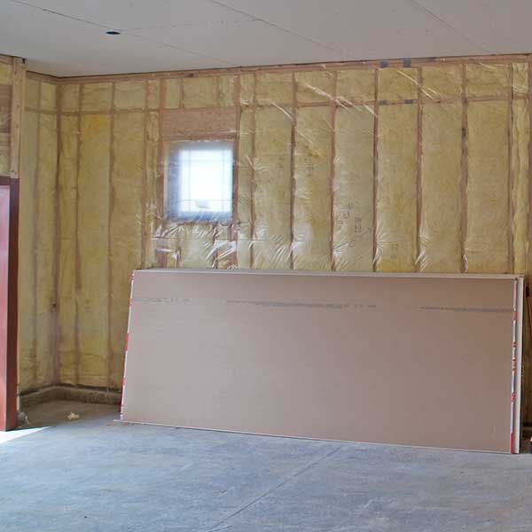 Insulated garage attached to new single family residence