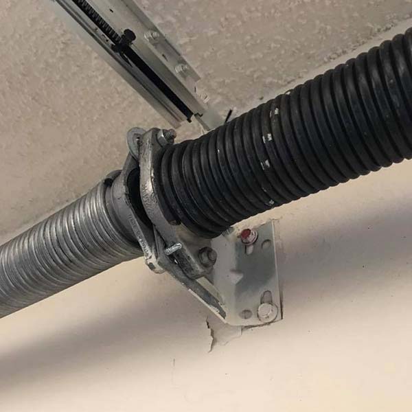 A damaged garage door spring needs repair in Seminole County, FL