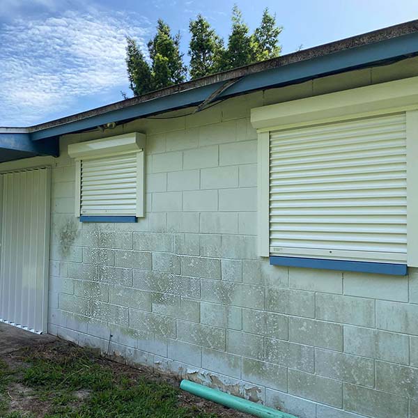 Hurricane shutters protect a home during storm season in Seminole County, FL