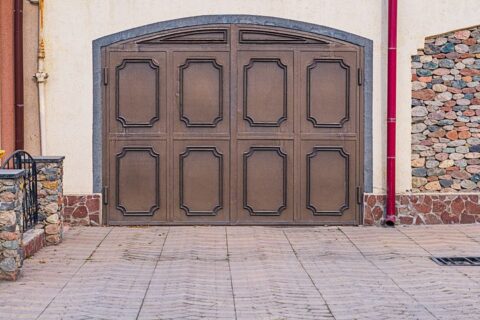 Closed decorative brown double garage door exterior in Seminole County, FL