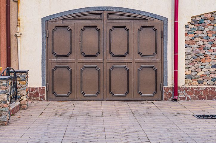 Closed decorative brown double garage door exterior in Seminole County, FL