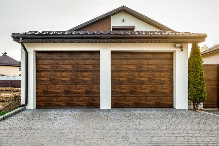 Double wooden garage doors on residential home in Orlando and Central Florida