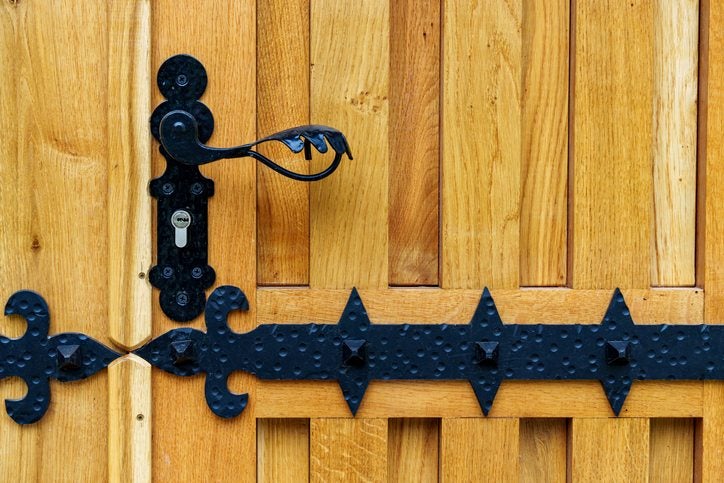 Decorative black hardware on a wooden garage door in Orlando & Central FL